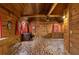 Bedroom with brick flooring, wood walls and cabinets, and rustic decor at 3401 Clay Rd, Austell, GA 30106