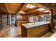 Unique kitchen featuring brick floors, butcher block island and mosaic tile accents at 3401 Clay Rd, Austell, GA 30106