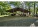 Outbuilding with roof, multiple posts and gravel base at 3401 Clay Rd, Austell, GA 30106