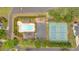 Aerial view showcases community amenities including the pool, tennis courts, ample parking, and manicured landscaping at 4380 Laurian Nw Dr, Kennesaw, GA 30144