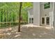 This spacious wooden deck offers a tranquil view of the surrounding trees at 4380 Laurian Nw Dr, Kennesaw, GA 30144