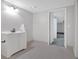 Bright, functional bathroom with a classic white vanity and neutral tiles at 4380 Laurian Nw Dr, Kennesaw, GA 30144