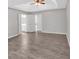 Large bedroom with a trey ceiling and an en suite bathroom with white double doors at 4380 Laurian Nw Dr, Kennesaw, GA 30144