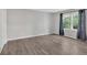 Open bedroom with large windows and stylish flooring offers bright, modern space at 4380 Laurian Nw Dr, Kennesaw, GA 30144