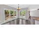 Dining area with a view of the deck, surrounded by large windows at 4380 Laurian Nw Dr, Kennesaw, GA 30144