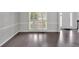 Inviting dining room with shutters, wainscoting detail, and adjacent foyer access at 4380 Laurian Nw Dr, Kennesaw, GA 30144