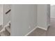 Hallway featuring carpeted stairs and a glass-paneled door, providing a clear view at 4380 Laurian Nw Dr, Kennesaw, GA 30144