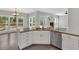Modern kitchen features granite countertops, stainless appliances, and a breakfast bar at 4380 Laurian Nw Dr, Kennesaw, GA 30144