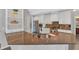 Modern kitchen featuring granite countertops, island with sink, and ample storage at 4380 Laurian Nw Dr, Kennesaw, GA 30144