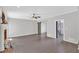 Cozy living room featuring a fireplace and stylish barn doors at 4380 Laurian Nw Dr, Kennesaw, GA 30144