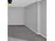 Neutral-colored room with soft carpeting and a modern ceiling fan at 4380 Laurian Nw Dr, Kennesaw, GA 30144