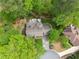 Aerial view of the home, nestled in trees at 4813 Fernie Ne Ct, Marietta, GA 30068