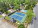 Aerial view of the community pool and tennis courts, in a neighborhood at 4813 Fernie Ne Ct, Marietta, GA 30068