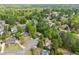 Beautiful homes with pools nestled among lush trees and mature landscaping in quiet residential neighborhood at 4813 Fernie Ne Ct, Marietta, GA 30068