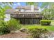 Lush backyard featuring a deck and mature trees at 4813 Fernie Ne Ct, Marietta, GA 30068
