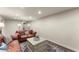 Cozy finished basement with comfortable seating and recessed lighting provides a relaxing space at 4813 Fernie Ne Ct, Marietta, GA 30068