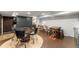 Basement dining area with a wine-barrel table, rustic wood table, and access to the back yard at 4813 Fernie Ne Ct, Marietta, GA 30068