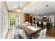 Charming dining area bathed in natural light, connecting to a kitchen and offering outdoor views at 4813 Fernie Ne Ct, Marietta, GA 30068