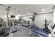 Well-equipped home gym featuring a variety of exercise machines and free weights for fitness enthusiasts at 4813 Fernie Ne Ct, Marietta, GA 30068