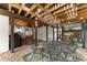 Inviting covered patio area with metal furniture and string lights at 4813 Fernie Ne Ct, Marietta, GA 30068