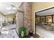 Spacious sunroom with brick accents, offering seamless transition to a cozy living room at 4813 Fernie Ne Ct, Marietta, GA 30068
