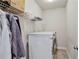 Convenient laundry room with a washer and dryer at 5022 Towneship Creek Rd, Roswell, GA 30075
