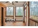 Cozy porch with wood and a private seating area at 5022 Towneship Creek Rd, Roswell, GA 30075