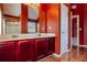 Bathroom featuring a tiled floor, double vanity, and shower-tub combo at 5840 Harrier Ln, Atlanta, GA 30349
