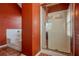 Bathroom featuring a tiled floor, tub-shower, and glass-enclosed shower at 5840 Harrier Ln, Atlanta, GA 30349
