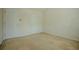 This bedroom has two white doors and neutral carpet with blank walls ready for your personal touch at 5840 Harrier Ln, Atlanta, GA 30349