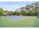 Multiple tennis courts with well-maintained green and blue surfaces at 899 Fairwood Nw Way, Acworth, GA 30101