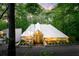 Striking home exterior with unique modern design, surrounded by mature trees and landscaping at 1121 Dawn View Nw Ln, Atlanta, GA 30327