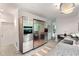 Modern kitchen with stainless steel appliances, including a built-in oven and refrigerator, complemented by granite countertops at 1121 Dawn View Nw Ln, Atlanta, GA 30327