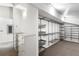 Spacious walk-in closet with custom shelving and storage solutions, providing ample space at 1121 Dawn View Nw Ln, Atlanta, GA 30327