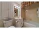 Bathroom featuring a shower and tub combination with white cabinets at 1924 Windburn Ct, Snellville, GA 30078