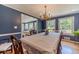 Dining room with hardwood floors and access to the bright living room at 1924 Windburn Ct, Snellville, GA 30078