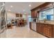 Bright kitchen features wooden cabinets, stainless steel appliances, and a breakfast area at 1924 Windburn Ct, Snellville, GA 30078