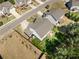 Bird's eye view of a home with a green lawn, trees, a fenced yard, and a patio set at 3875 Grandview Manor Dr, Cumming, GA 30028