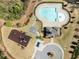 Aerial view of community featuring a pool, playground, clubhouse, and lush landscaping at 3875 Grandview Manor Dr, Cumming, GA 30028