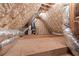 View of the home's attic with insulation and ventilation system at 4266 Paces Ferry Road Se, Atlanta, GA 30339