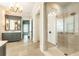 The bathroom features a walk-in shower and a sink vanity with natural lighting at 4266 Paces Ferry Road Se, Atlanta, GA 30339