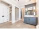Bathroom with a shower, vanity, and lots of natural light at 4266 Paces Ferry Road Se, Atlanta, GA 30339