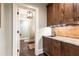 Butler's pantry with custom wood cabinets and countertops at 4266 Paces Ferry Road Se, Atlanta, GA 30339