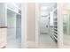 A very large walk-in closet with lots of shelving at 4266 Paces Ferry Road Se, Atlanta, GA 30339