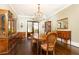 Elegant dining room features hardwood floors and classic wood furniture at 4266 Paces Ferry Road Se, Atlanta, GA 30339