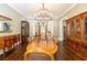 Beautiful dining room with gleaming hardwood floors and lots of wood cabinetry at 4266 Paces Ferry Road Se, Atlanta, GA 30339