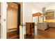 Convenient residential elevator adjacent to a kitchen featuring stainless appliances and center island at 4266 Paces Ferry Road Se, Atlanta, GA 30339