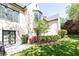 Lovely yard with flowers and trees surrounding home, creating a lush and inviting outdoor space at 4266 Paces Ferry Road Se, Atlanta, GA 30339