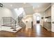 Grand foyer with hardwood floors, staircase with iron railings, and custom built-in cabinets at 4266 Paces Ferry Road Se, Atlanta, GA 30339