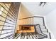Overhead view of the staircase with wrought iron railings at 4266 Paces Ferry Road Se, Atlanta, GA 30339